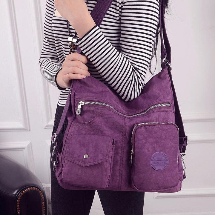 Bolsa mochila crossbody