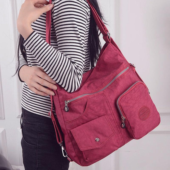 Bolsa mochila crossbody