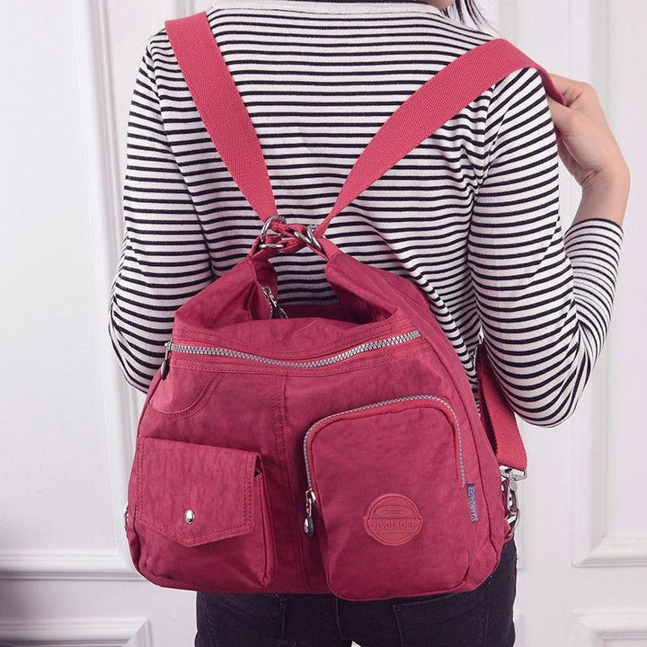 Bolsa mochila crossbody