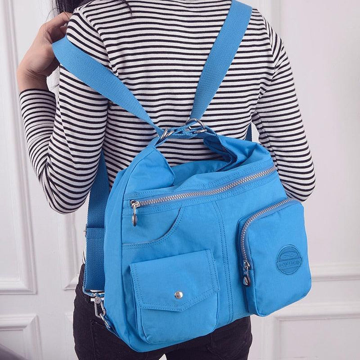 Bolsa mochila crossbody